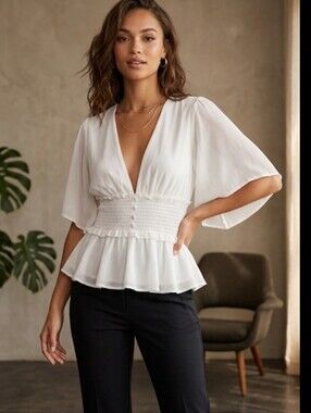 NEW WITH TAGS. By Kabira Smocked Waist V-Neck Peplum Wms Blouse - White  SIZE M